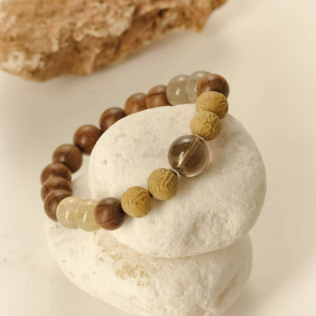 Earth Element incense bracelet with crystals and wood, money drawing